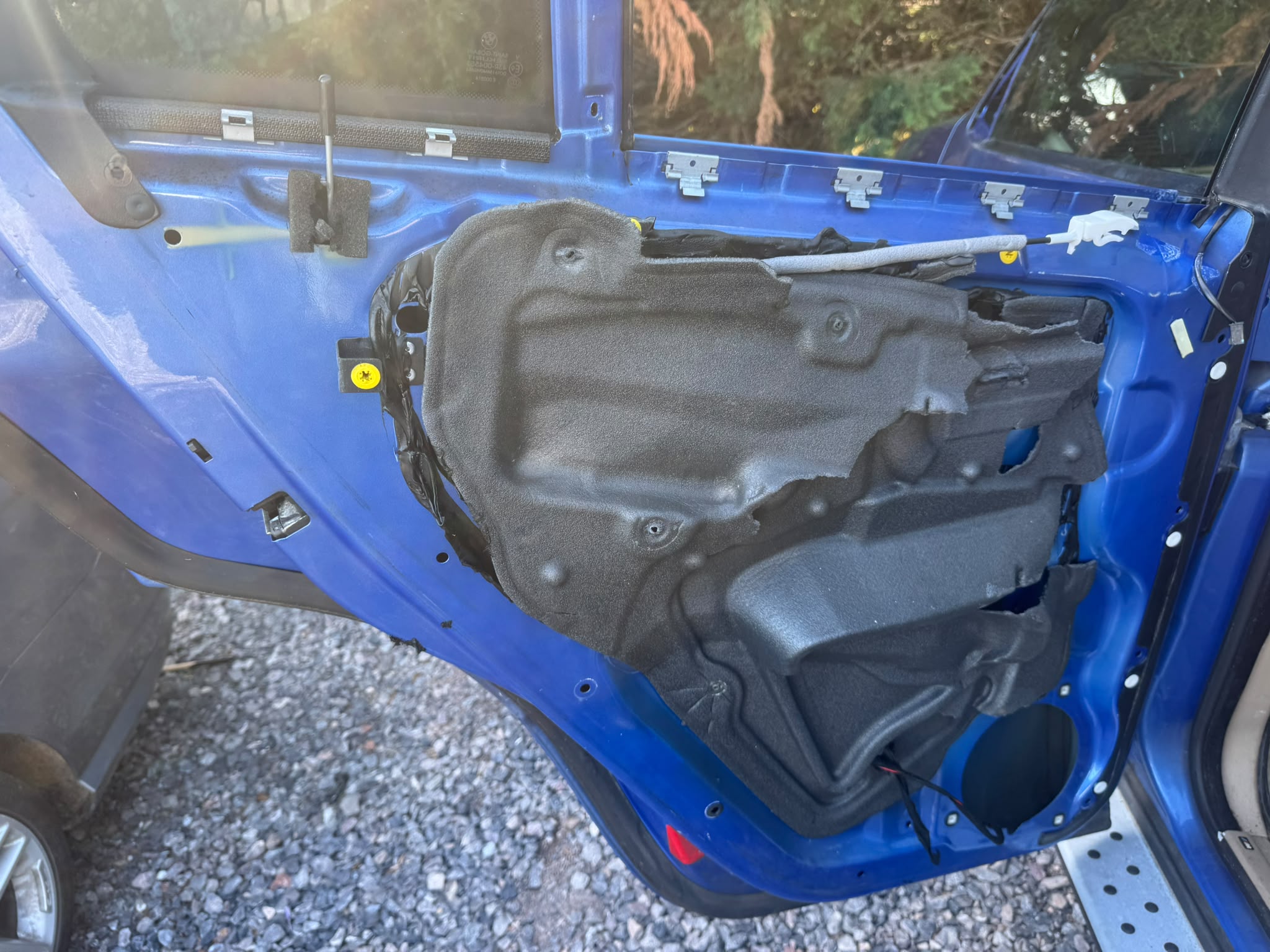 Blue BMW X5 passenger door